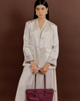 Model carrying Rico Rinaldi Mendy Deep Maroon East-West shoulder bag, premium crocodile embossed PU vegan leather women's work handbag with detachable mini pouch